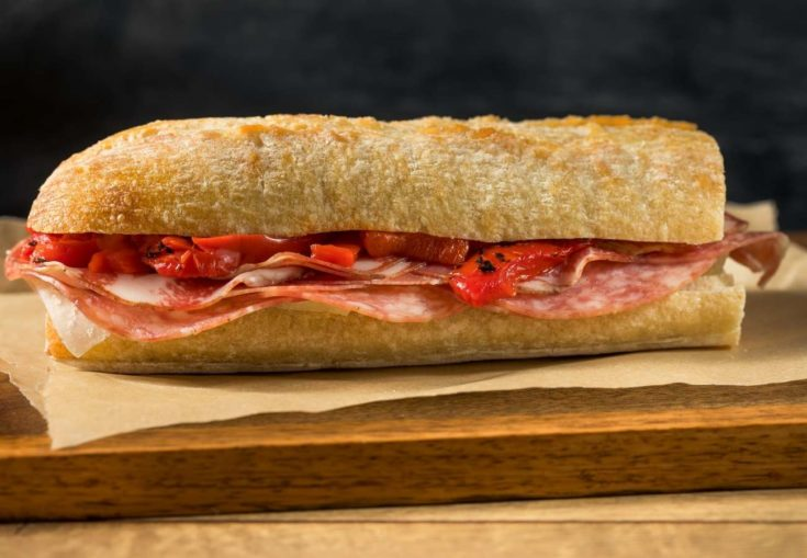 For a more substantial spanish street food option, Spaniards often turn to bocadillos—hearty sandwiches made with a baguette-like bread known as barra