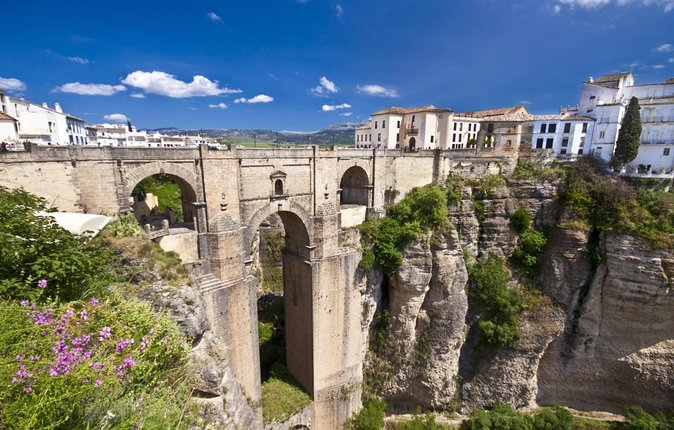 Puente Nuevo is the iconic symbol of Ronda, an architectural marvel spanning the deep El Tajo gorge that divides the town