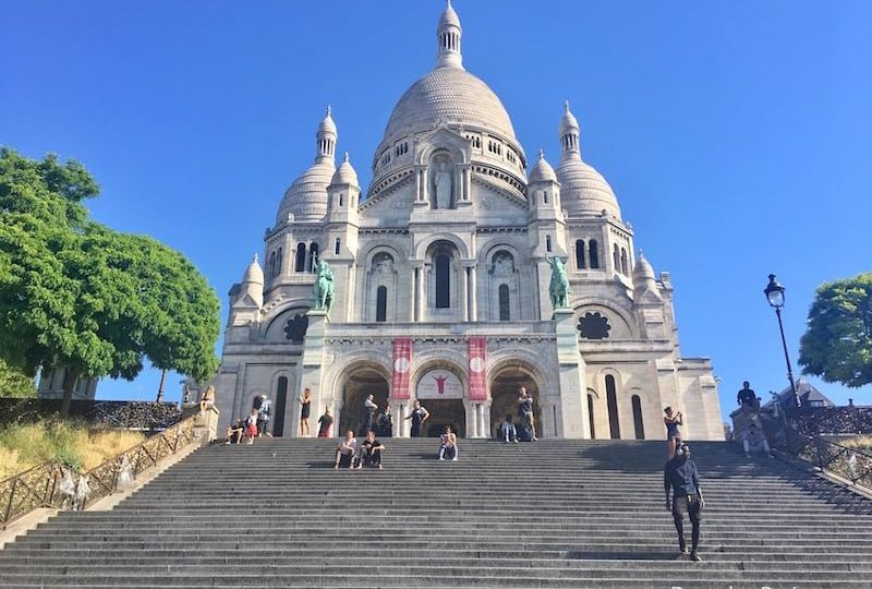 Montmartre, the historic district on a hill in northern Paris, is famous for its bohemian atmosphere, winding streets, and artistic heritage