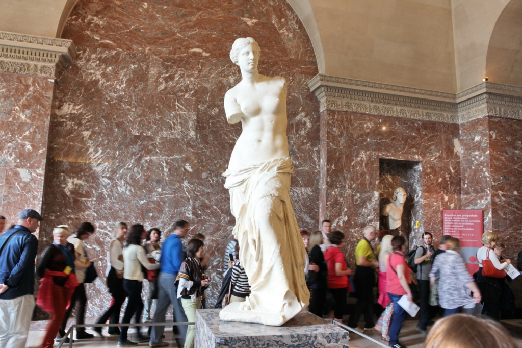 Another iconic piece of ancient Greek sculpture, the Venus de Milo, is believed to represent Aphrodite, the goddess of love and beauty in Louvre Museum.