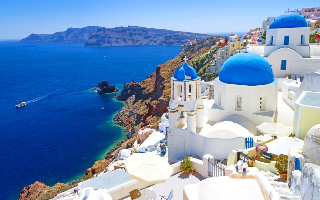 Santorini on of the most famous islands in the world, is famous for its stunning sunsets, white-washed buildings, and crystal-clear waters