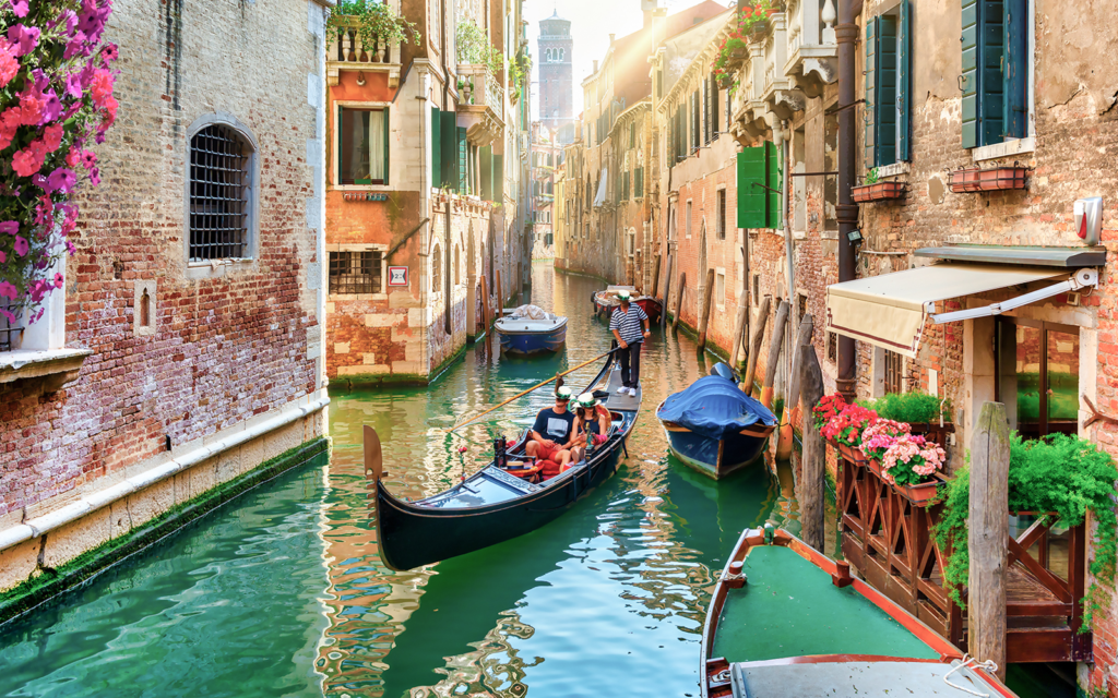 Venice is described as a city like no other while it stands on a complex of canals, and it is well-known for the atmosphere it creates through romance . most visit on italy