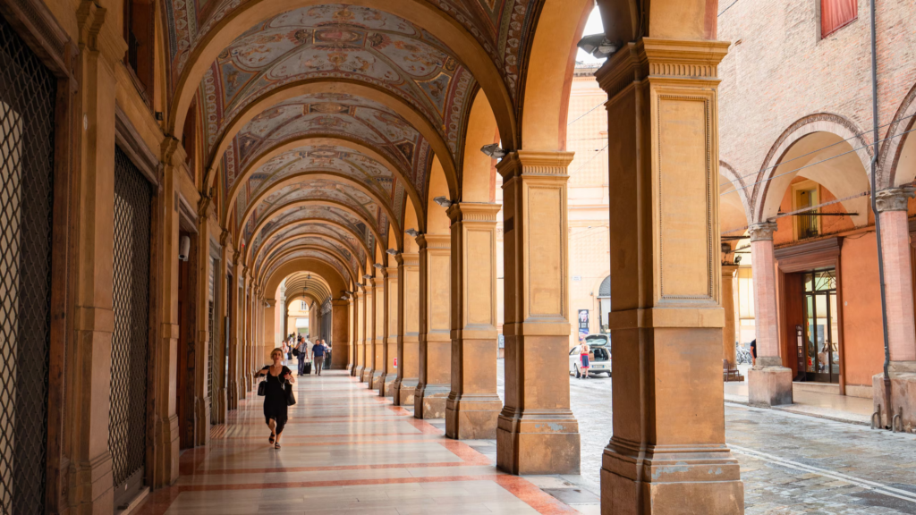 Bologna is known for its medieval towers, porticoes, and delicious cuisine