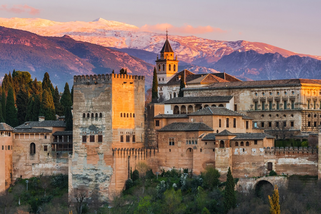 Take a bus or train to Granada (2.5 to 3 hours, tickets costing €25 to €35). Granada is home to the magnificent Alhambra, a UNESCO World Heritage Site and a pinnacle of Moorish architecture.