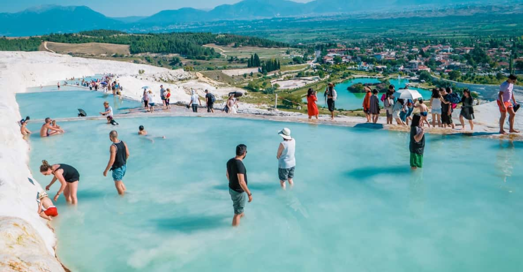 Pamukkale, which translates to "Cotton Castle" in Turkish, is famous for its stunning white travertine terraces formed by mineral-rich thermal waters. This UNESCO World Heritage site is a natural wonder that looks like something from another planet.