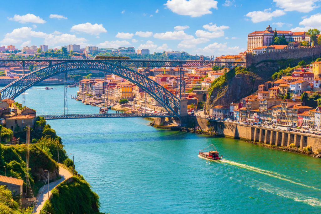 Porto, Portugal’s second-largest city, is renowned for its wine, scenic riverside views, and historic charm