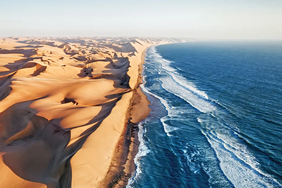 Namibia is a land of stark beauty, where towering sand dunes meet the vast expanse of the Atlantic Ocean. Known for its unique landscapes and abundant wildlife, Namibia offers a quieter and less crowded safari experience compared to other African destinations.