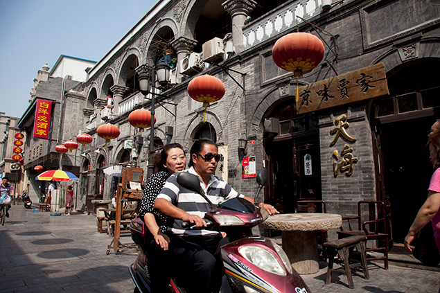 Beijing is known for its expansive parks and traditional hutongs (alleyways). Spend your morning at the Temple of Heaven, a beautiful imperial complex set within a park. Entry is CNY 35 ($5), and you can spend a couple of hours walking around the gardens.